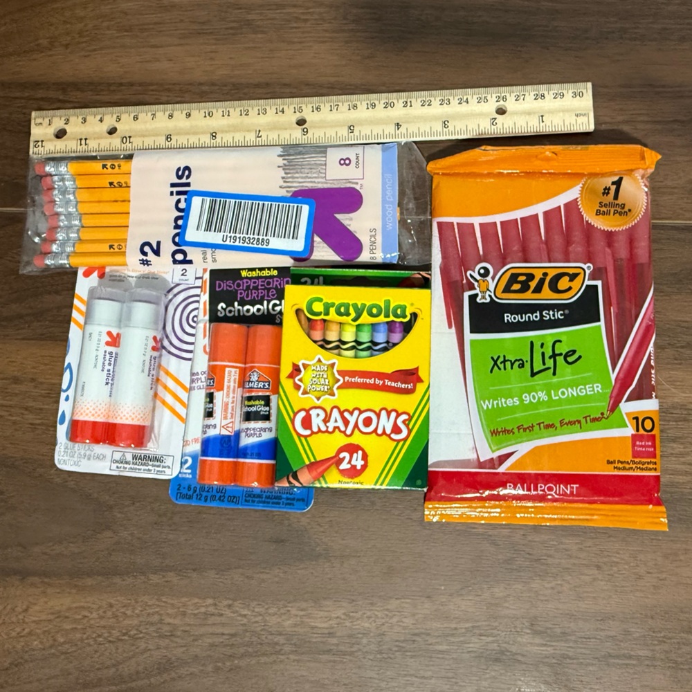 School supply bundle, pens, crayons, pencils, ruler, glue sticks.